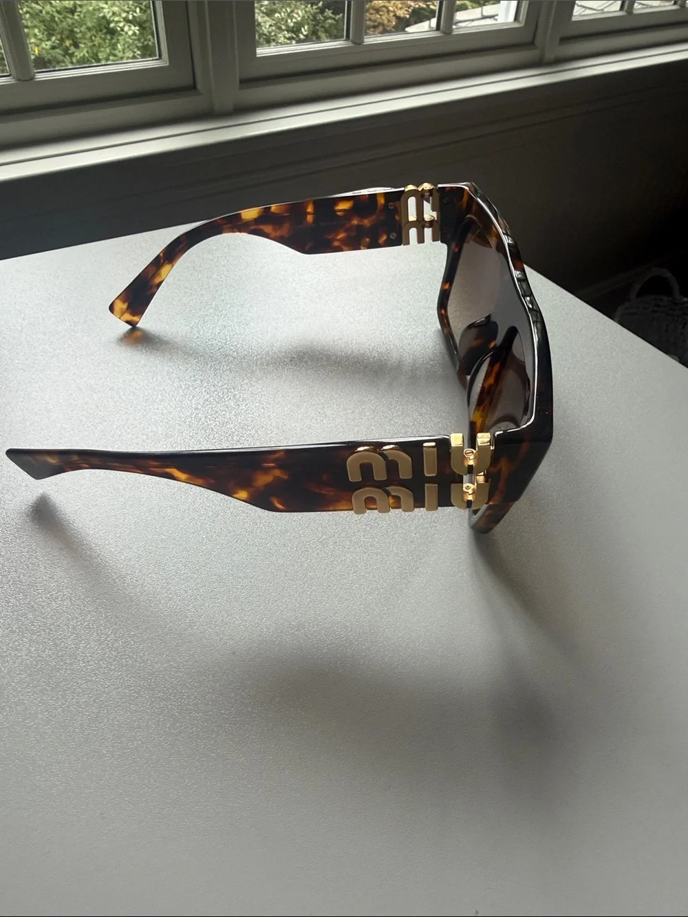Miu Miu bold tortoiseshell